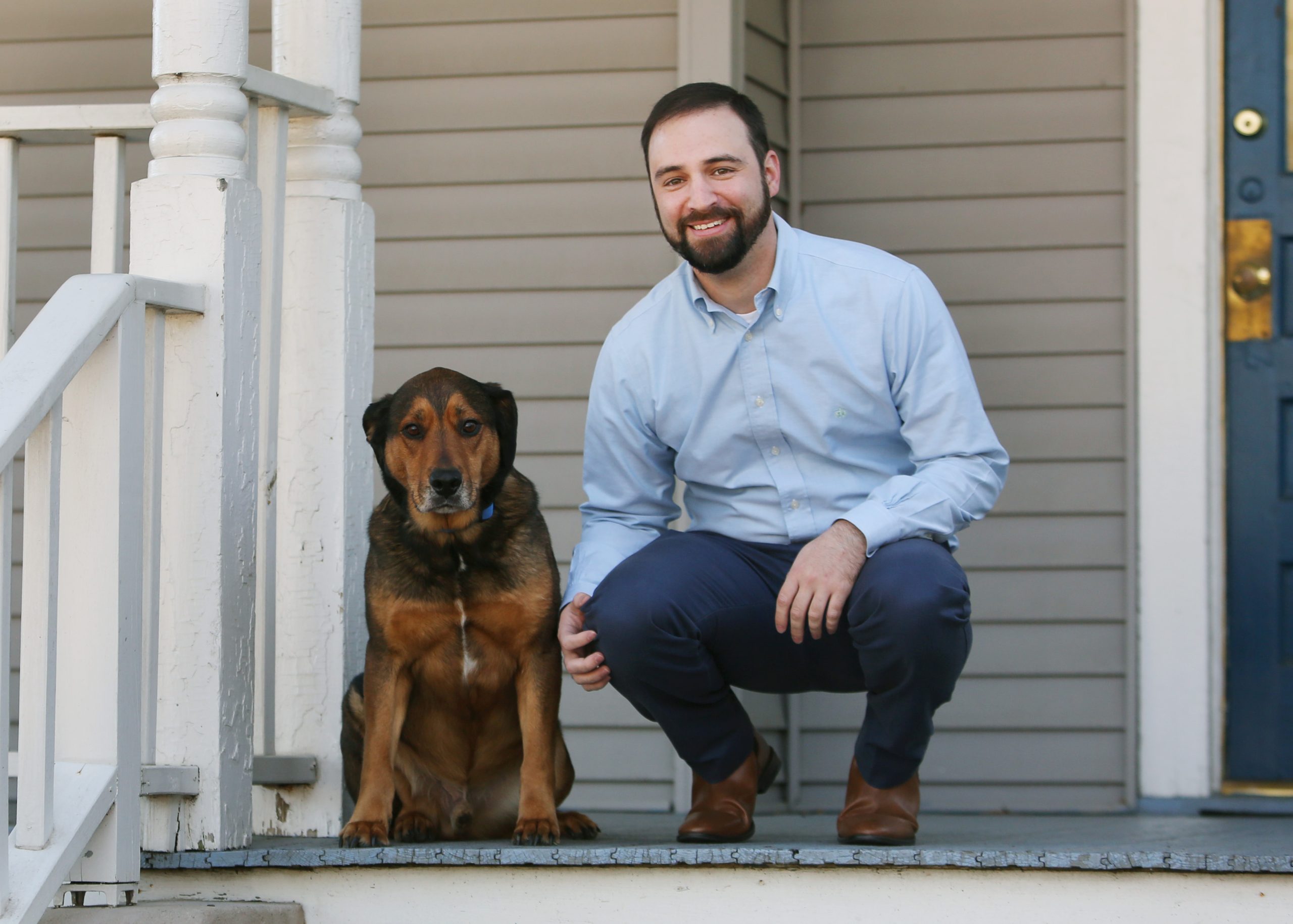 Christopher Mann of Mann, McGibney & Jordan with his dog Tucker